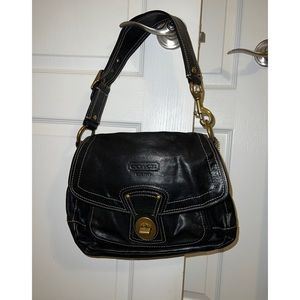 Leather coach bag with large gold hardware